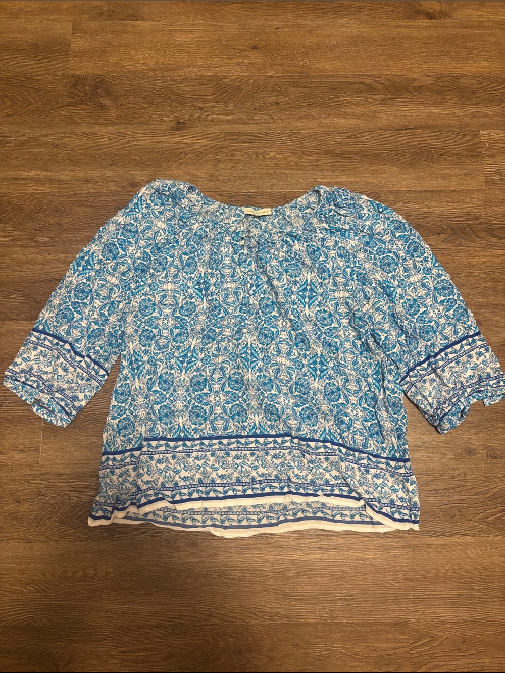 women’s blue and white blouse